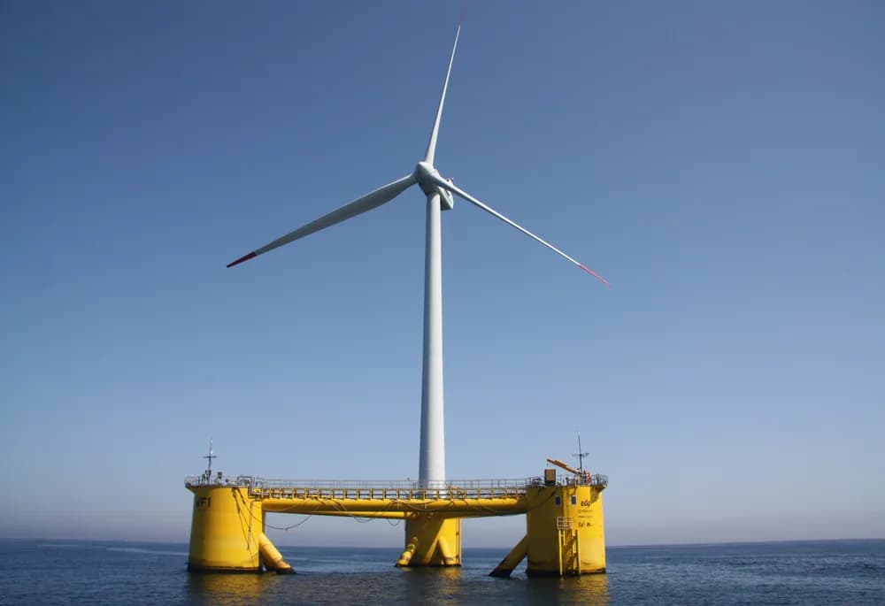 A floating offshore wind turbine foundation under tow at sea