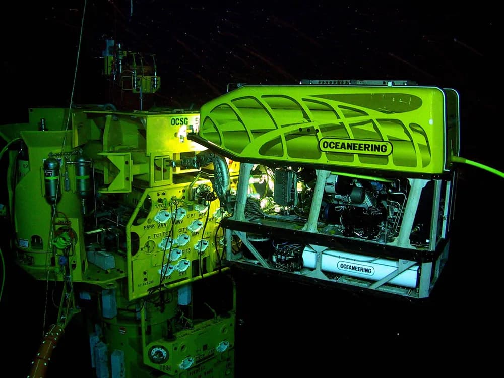 A remotely operated vehicle working on a subsea structure underwater